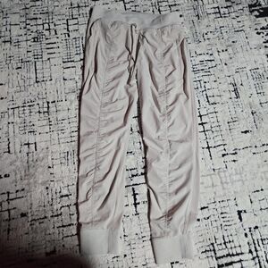 ATHLETA Attitude Pant Sz 8 Petite Tan  Lightweight Pockets Ruched Sides